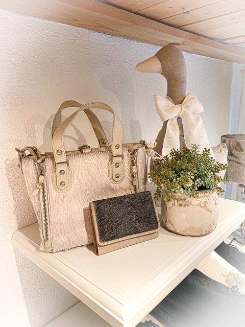 Handtaschen und Portemonnaies